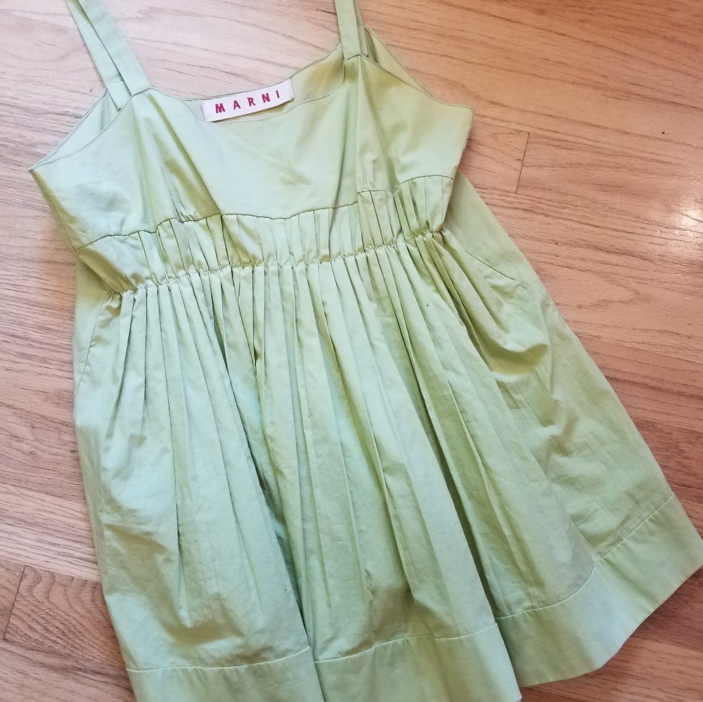 Chartreuse sleeveless baby doll style shirt